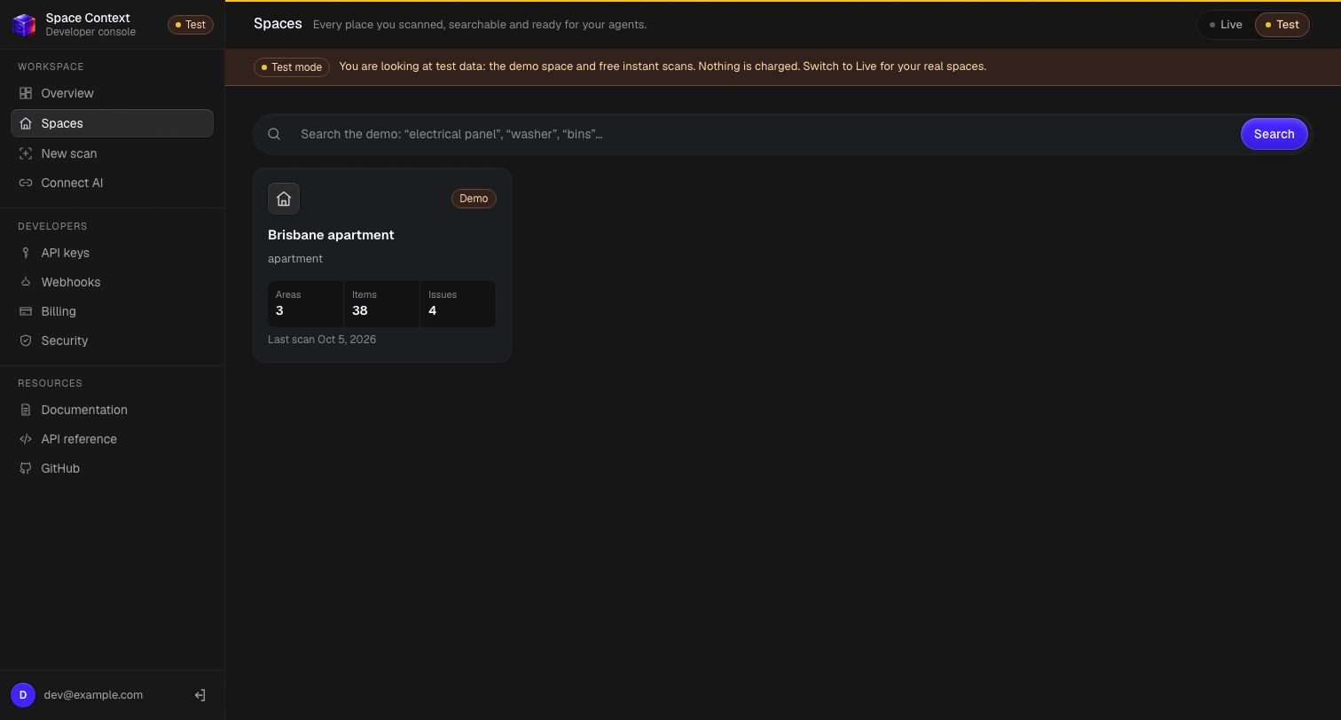 The Spaces page of the console in Test mode: the demo space, with its areas, items and issues, and a search box across every space